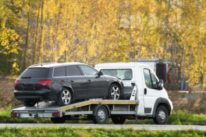 A tow truck recovery with a flatbed can transport your vehicle to safety and provide roadside assistance.